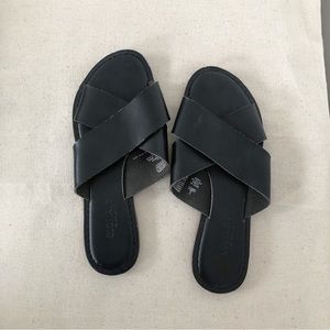 Black crisscross strapped sandals